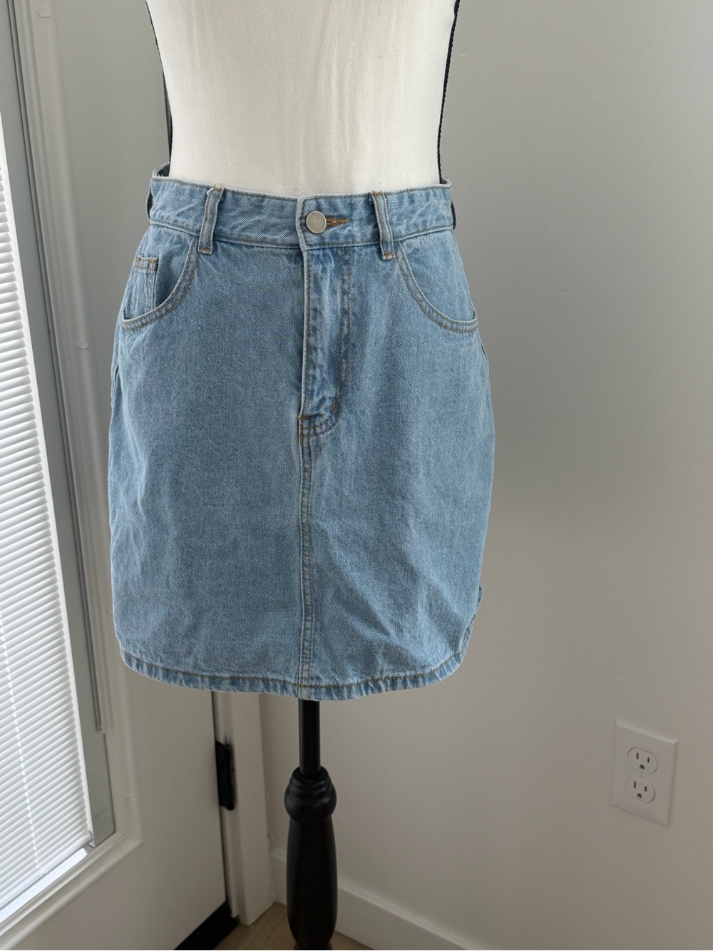 Light Blue Denim Mini Skirt with Front Pockets